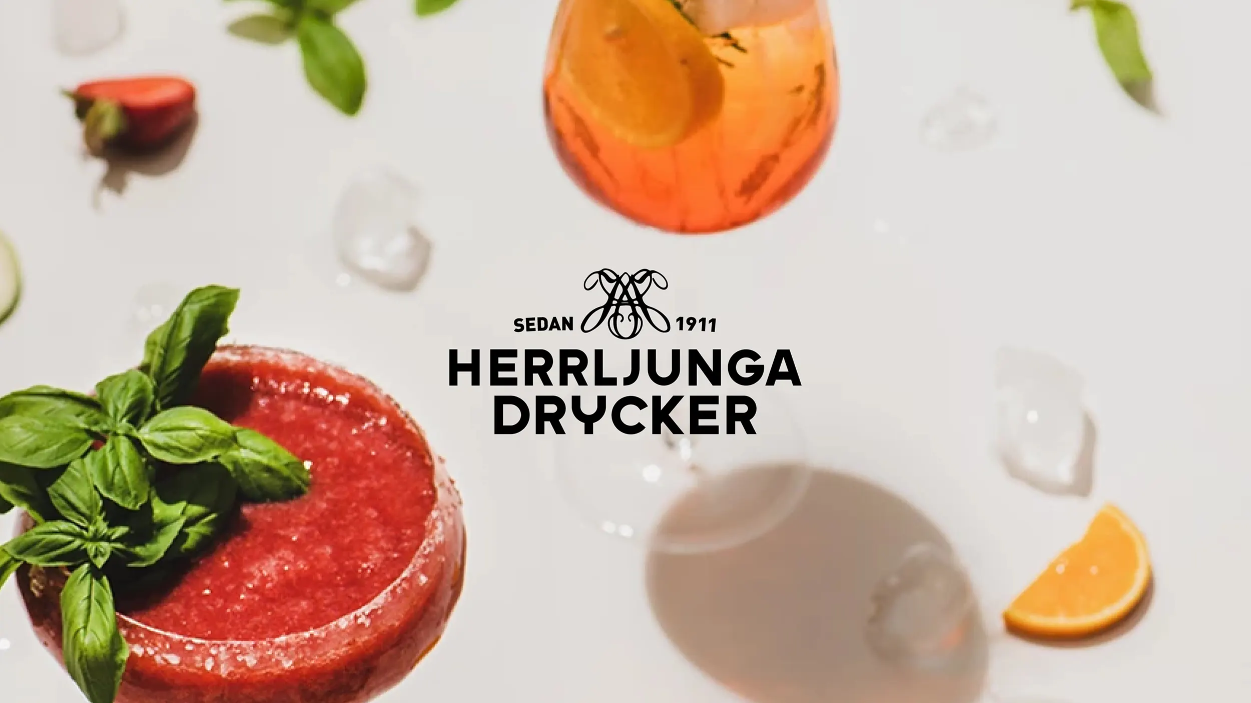 Logotyp Herrljunga drycker med drinkar